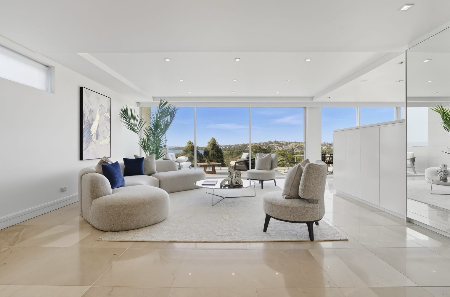 pitcure of lounge room neutral tones looking out through large glass ceiling to floor windows  3/62 Drumalbyn Road, Bellevue Hill, NSW 2023 was the top unit sale in April 2026 in this suburb 