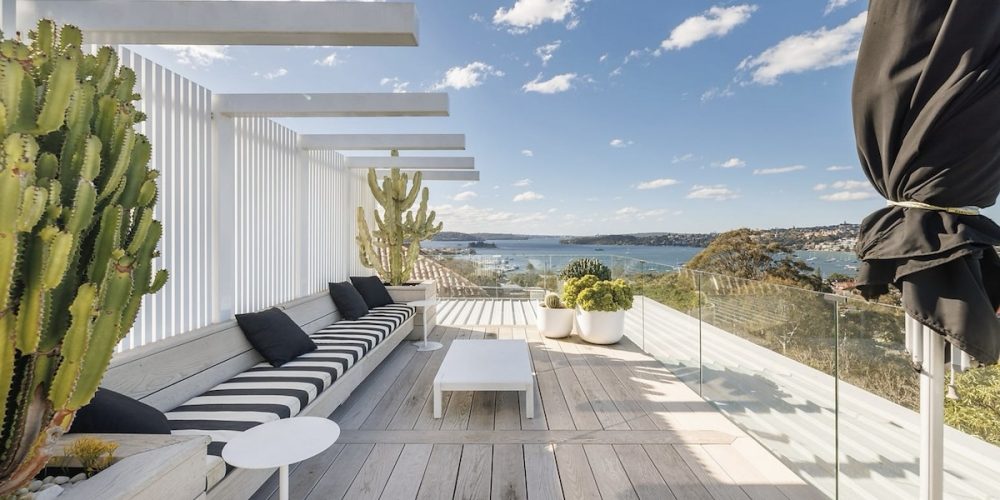 outdoor roof top terrace with blue and white striped upholstery this home at 55A CRANBROOK ROAD, BELLEVUE HILL was sold in December 2025 for $11m