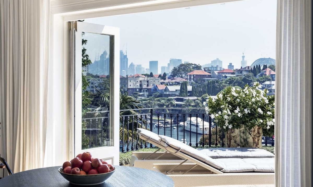 view of city skyline and top of Sydney Harbour Bridge at Cremorne Point Residence